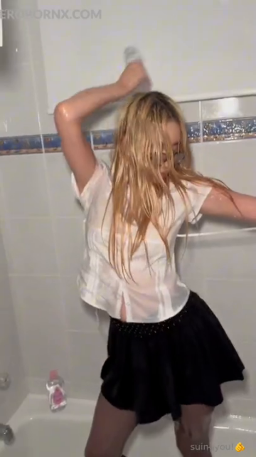 Slutty Lil Tay striptease in shower with tits & cash leak